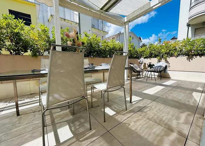 Menotti Attico-flexrent Immobiliare Abissinia ריצ'יונה